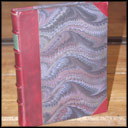 Three-quarter binding with marbled paper cover