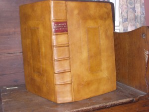 Full-leather binding with raised cords and leather label.